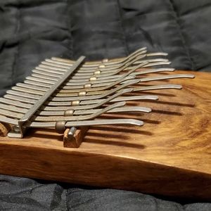 Karimba, 17-key, two rows, built-in 1/4" jack, Hugh Tracey; tunable, portable.